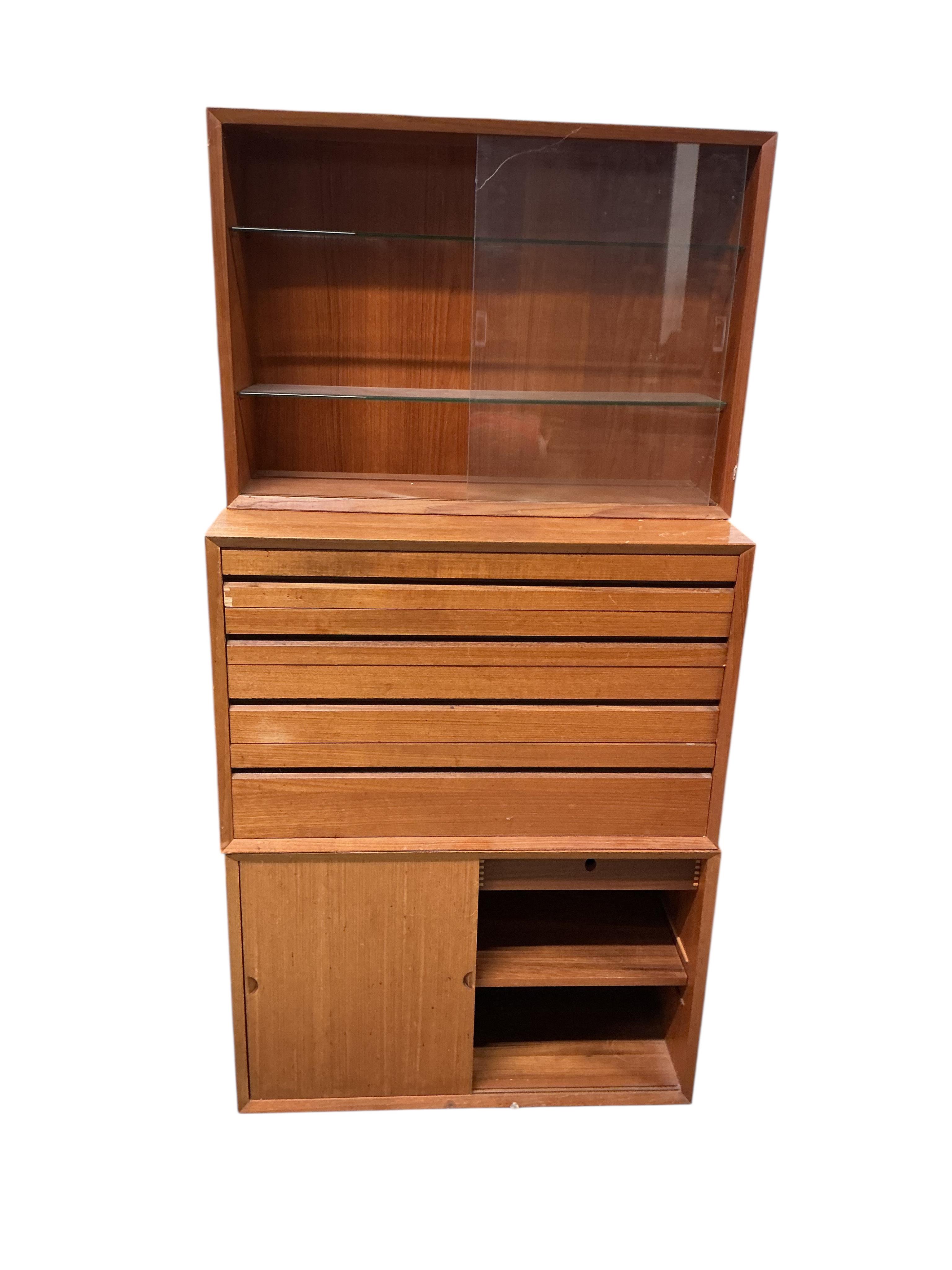 A Poul Cadovius Royal System teak three section wall system, width 80cm, depth 46cm, height 159cm